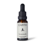 An amber glass bottle of 20ml essential oil with a black dropper lid and white label featuring the Japanese kanji character for "earth" and the words EARTH and homework brand name.