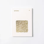 The Sankaku Vol. 02: Ramen soft-back book, featuring a gold foil stamped illustration of ramen noodles by Stanely Sun.