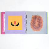 Two open facing pages of Kokuyo's Face Sticker Book, available at NiMi Projects UK, featuring, on the left, a yellow square with an orange nose and black moustache and, on the right, a tawashi scrubbing brush. All the illustrations in the book are by Tupera Tupera, an artist unit in Japan known for it's children's books illustrations.