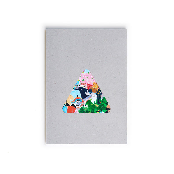 The softback cover of Sankaku Vol. 1, a book about Tokyo's small manufacturing and craft businesses, in speckled grey, featuring a triangle cutout showing part of an colorful illustration of Japan by Grace Lee, available at NiMi Projects UK.
