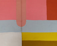 Close up of a contemporary style Japanese noren curtain, showing where the two panels of the curtain join. The textile has a bold abstract pattern, created by sewing different coloured rectangles of  fabrics together using the traditional Korean bojagi technique. Designed and Hand crafted by Amy Croft, Modja Modja House and available at NiMi Projects UK. ©Amy Croft.