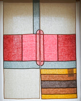 A contemporary Japanese noren curtain, featuring a large abstract pattern of pink, red, pale blue, yellow and brown rectangles and stripes. The curtain is lit from behind, making it translucent and each shape outlined by traditional Korean bojagi hidden seams. Designed and handcrafted by Amy Croft, Modja Modja House and available at NIMi Projects UK. Image ©Amy Croft