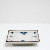 Large square Japanese vintage porcelain dish.  It features a border design of blue underglaze bunches of grapes and vine leaves and a crackle glaze.