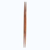A pair of brown double-end tapered ryokuchi wooden hashi chopsticks made by Style of Japan, on a white background. Available at NiMi Projects UK.