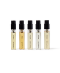 Five small perfume bottles labeled 'Earth', 'Fire', 'Metal', 'Water', and 'Wood' by 'homework' on a white background.