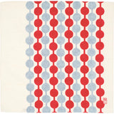 A Musubi furoshiki wrapping cloth, featuring a lines of dots, alternating in red and grey, designed by Takehisa Yumeji.