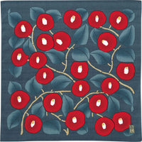 A Musubi furoshiki wrapping cloth in green, with a pattern of red tsubaki (Camellia) flowers and leaves, designed by Takehisa Yumeji.