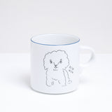 A  white porcelain mug, designed by Angle Ceramics in Japan and available at NiMi  Projects, featuring an illustration of a fluffy puppy and the words "Bow wow" and a blue rim.