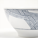 Closeup of a Ito Tsumugi Japanese porcelain mino-yaki ramen and noodle bowl in white, featuring a pattern of criss crossed lines, designed after a Japanese weaving technique. Available at NiMi Projects UK.