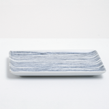 The Angle Ito Tsumugi rectangular sushi plate, showing its pattern of fine blue lines. Made in Japan by Angle and available at NiMi Projects UK.