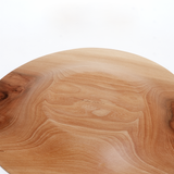 Detail of the edge of a Solmu Puut himeshara (stewartia) wooden plate, showingcasing the natural wood grain pattern. The plate is hand turned in Japan from thinned wood collected from Yakushima. On show at NiMi Projects Uk.
