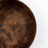 Detail of the edge of a large wild cherry wood bowl, hand turned and shaped by Japanese artisan Solmu Puut. The wood is sourced from forest thinning projects in Yakushima, Japan and finished with layers of Japanese washi paper and urushi lacquer. On display at NiMi Projects UK.