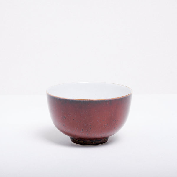  A vintage mahogany brown Japanese tea cup made of extra-light Arita porcelain, rich brown glaze and subtly speckled in black.
