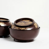 Two vintage Japanese laquerware lidded bowl, with deep red lacquer and gold gilt, hand-painted peonies and leaves on the lid. Available at NiMi Projects UK.