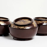 A group of vintage Japanese laquerware lidded bowl, with deep red lacquer and gold gilt, hand-painted peonies and leaves on the lid. Available at NiMi Projects UK.