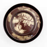 Ariel view of a vintage Japanese laquerware lidded bowl, with deep red lacquer and gold gilt, hand-painted peonies and leaves on the lid. Available at NiMi Projects UK.