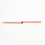 A set of Style of pink and wood Japan bi-colour Oedo hashi chopsticks, with a small black label wrapped around the centre with "Style of Japan" printed in white.