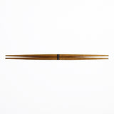A pair of brown double-end tapered ryokuchi wooden hashi chopsticks made by Style of Japan, on a white background. Available at NiMi Projects UK.