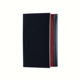A top view of a Postalco Card Holder with a navy blue soft cow-hide cover and red cotton textile inner.