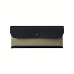 Image of a Postalco Snap Pen Case with a navy blue soft, cow-hide top with metal snap clasp and mint green cotton textile central section.