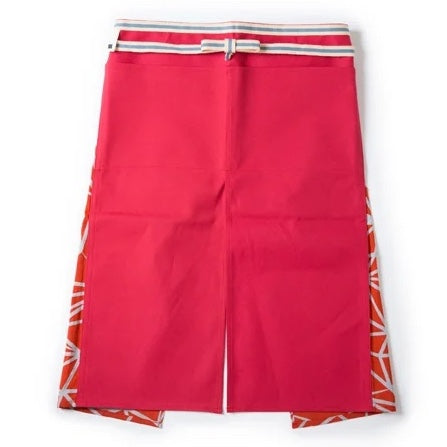 A red long contemporary maekake Japanese apron, featuring side panels with a white "crystal" pattern of lines, and a grey and white waist belt.