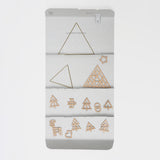 Sukima Forest mobile, made in Japan and packaged in a foldout paper box, specially designed to keep it tidy. Mobile motifs include two brass triangles, a wooden triangle and star, and six trees, a bird, deer, snowman and Christmas stocking
