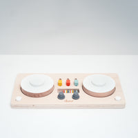 Dou? Little DJ wooden toy decks with moving parts that make different sounds. Designed in Japan