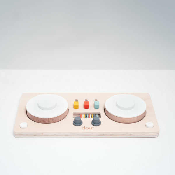 Dou? Little DJ wooden toy decks with moving parts that make different sounds. Designed in Japan