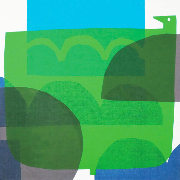 Masaru Suzuki's Water Bird furoshiki wrapping cloth design for Musubi, feating a large green rectangular bird layered over blue wave motifs. Made in Japan and on show at NiMi Projects UK.