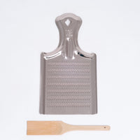 A pink aluminum oroshigane, Japanese grater, made in  Japan by Nanmoku and sold at NiMi Projects UK.