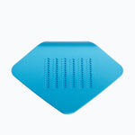 A sky-blue colored, stainless-steel Irogami kitchen hand grater, square in shape with a curved corner, designed and made in Japan and available at NiMi Projects UK.