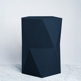 A Catachi card and paper faceted polygon stool in navy blue, inspired by origami, made in Japan and available at NiMi Projects UK.