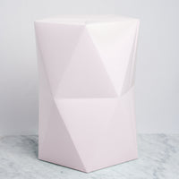 A Catachi origami-inspired pink polygonal stool, constructed in card and paper and made in Japan.