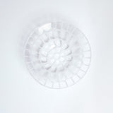 Top view of a handcrafted round transparent Afumi glass bowl, with white mosaic pattern, made in Japan by Saburo and available at NiMi Projects UK.