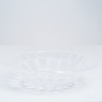 Side view of a conical transparent Afumi glass bowl, handcrafted by Saburo in Japan and available at NiMi Projects UK.