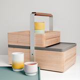 Hand crafted in Japan by Atelier Yocto, the wood Okamochi Box is versatile — double tiered with a removable top case, perfect as a picnic hamper, trug or home storage. Available at NiMi Projects, UK. 
