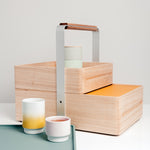 The two-tiered wooden Okamochi Box is made in Japan by Atelier Yocto. It's removable box and tray lid makes it ideal for picnics and home storage. Find it at NiMi Projects,  UK.