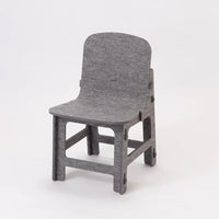 A grey Feelt children's chair made in Japan with a material using recycled pet bottles - image courtesy of Abode 