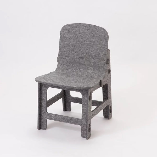A grey Feelt children's chair made in Japan with a material using recycled pet bottles - image courtesy of Abode 