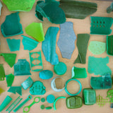 Green plastic waste collected from beaches in Japan by Buoy to be recycled into homeware products.