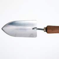A closeup view of Asano Mokkouso's stainless steel trowel blade, smithed in Japan's Tsubame-Sanjo metalworking area of Niigata. Available at NiMi Projects UK.