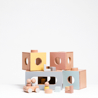 An animation of NiMi Projects' Dou Toy "I'm Home" wooden doll house and balancing game of box blocks, three dolls and a car.