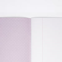 The lilac dotted inside cover of a Japanese notebook available at NiMi Projects UK, (unseen cover is white, featuring polar bear motifs).