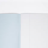 The powder blue striped inside cover of a Japanese notebook available at NiMi Projects UK, (unseen cover is pink, featuring poodle motifs).