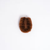 A brown Kamenoko hemp palm tawashi kitchen scrubbing brush, made in Japan and on sale at NiMi Projects UK.