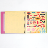 NiMi Projects UK's Kokuyo Face Sticker Book, laid out open to show a page of stickers to use to decorate face templates on other pages. The stickers feature differrent mouth shapes, abstract shapes and patterns, all illustrated by Japanese artist unit Tupera Tupera.
