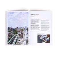 A page spread from Sankaku Vol 1., a book about craft and manufacturing in Tokyo, featuring an image of the city and text about the dyeing company Toya Senryo.